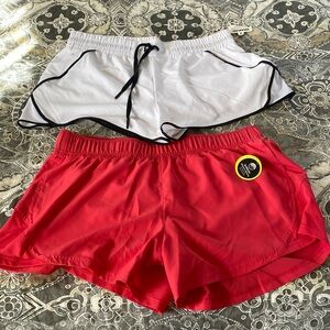 2 NWT pairs of running shorts. Size large